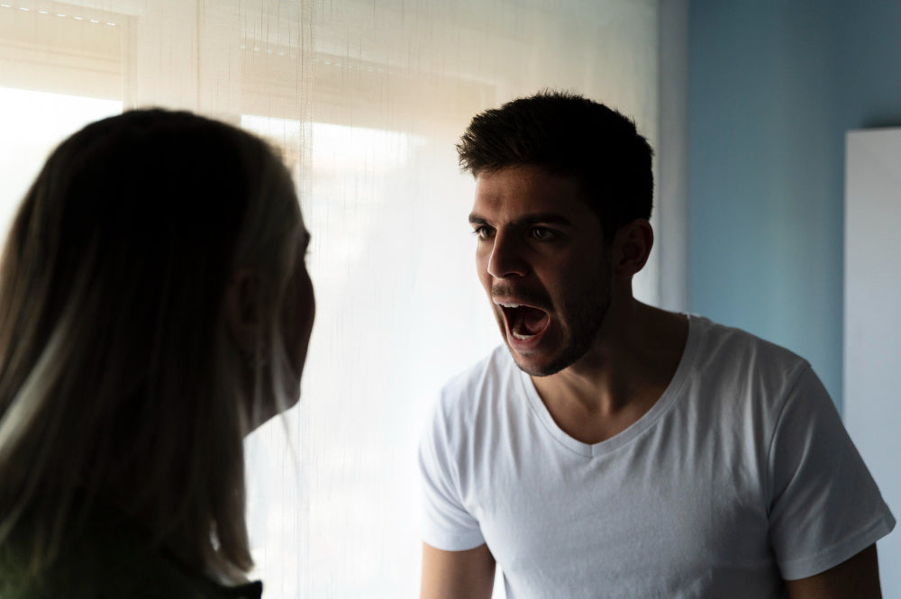 Dad taking a calm breath outside: how to manage anger after divorce without hurting your kids